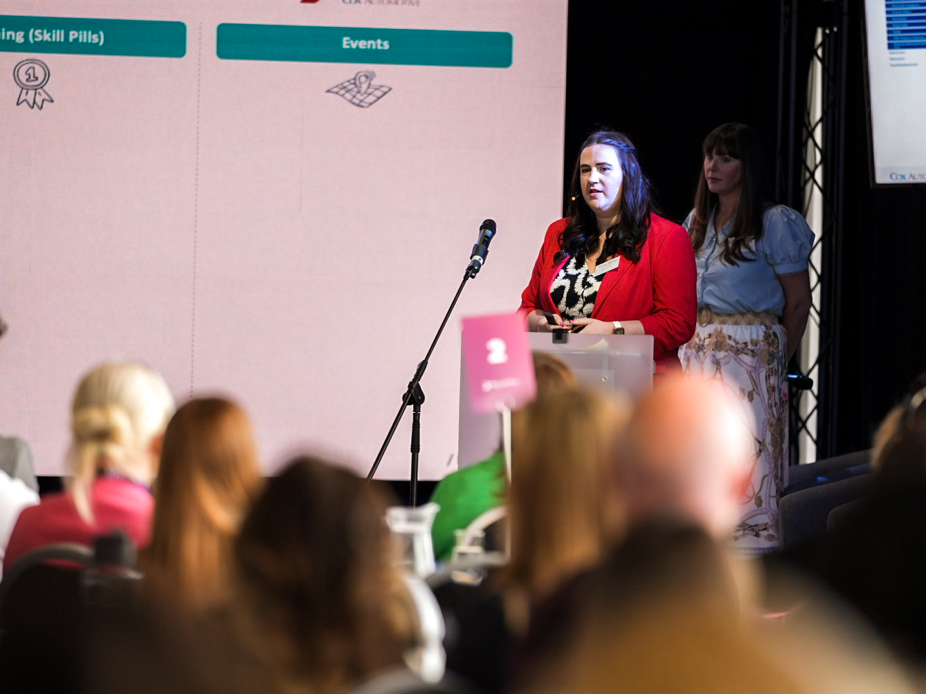 Emma on stage at Women with Drive