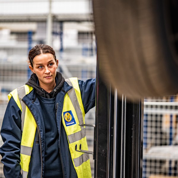 Female Manheim team member hi vis jacket
