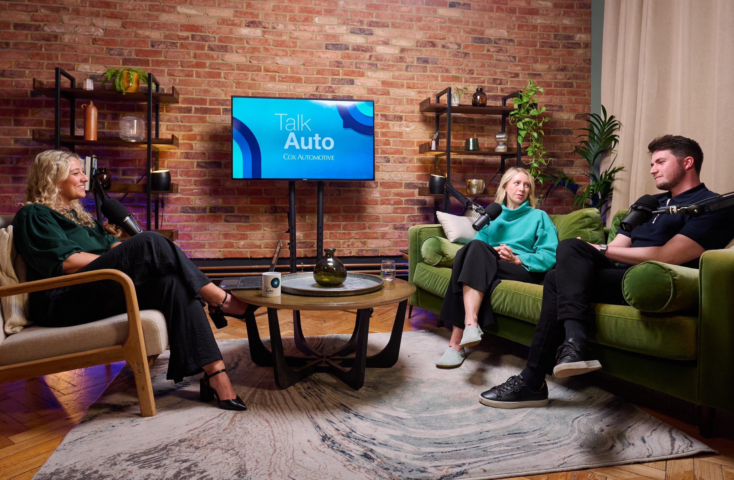 Talk Auto podcast guests on the sofa