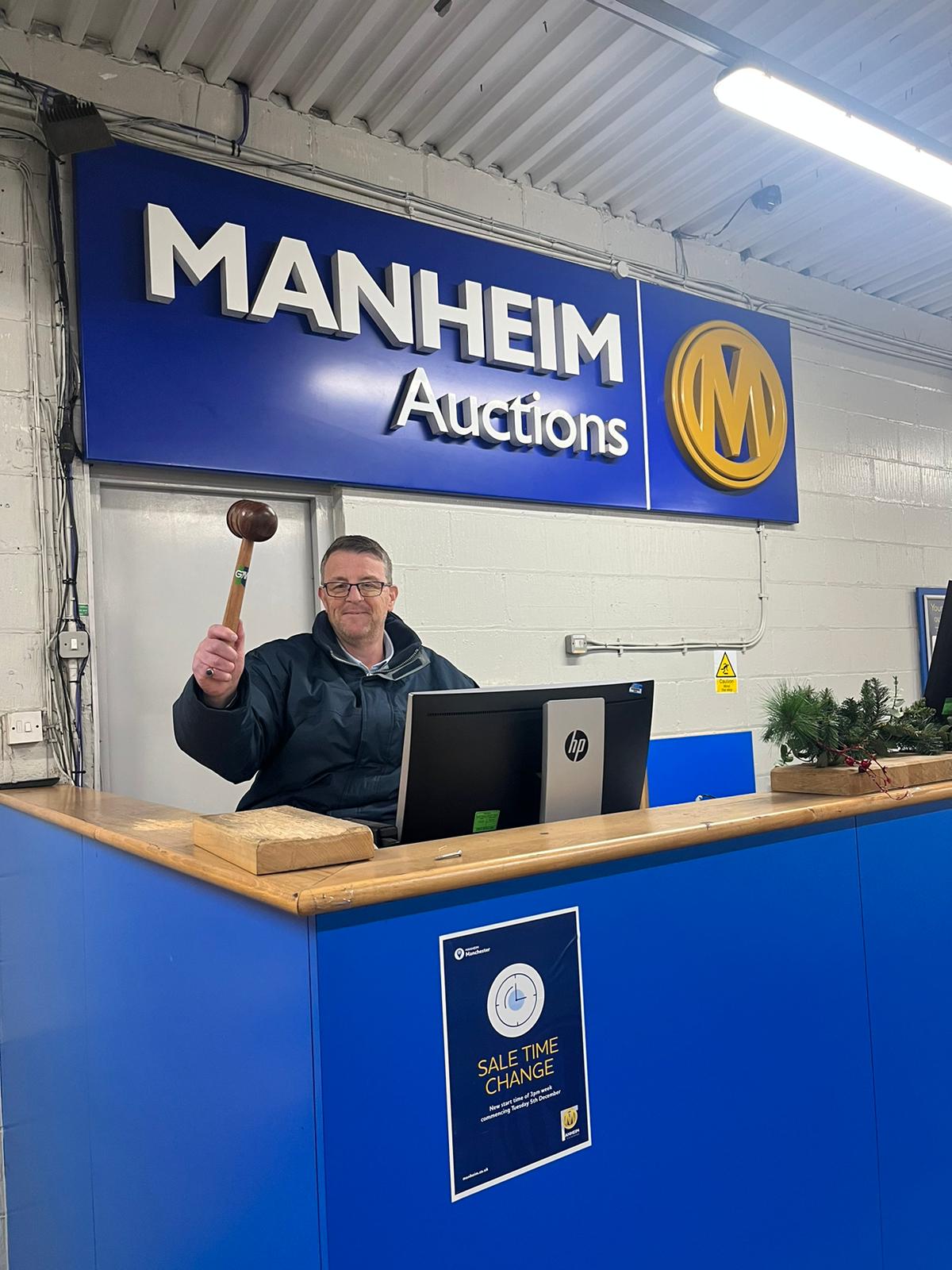 Andy Conde on a Manheim auction rostrum