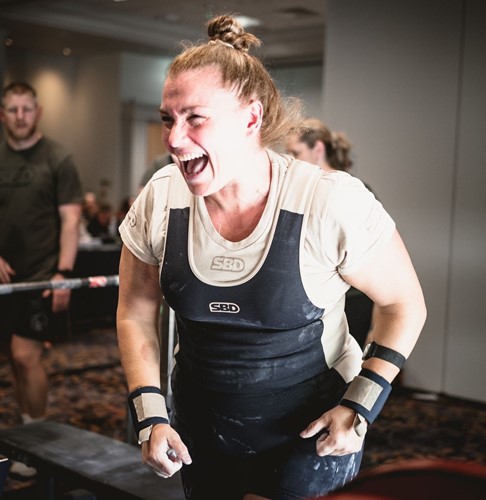 Gill Lomax, Head of Customer Experience and competitive power lifter