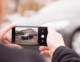 Phone taking picture of car
